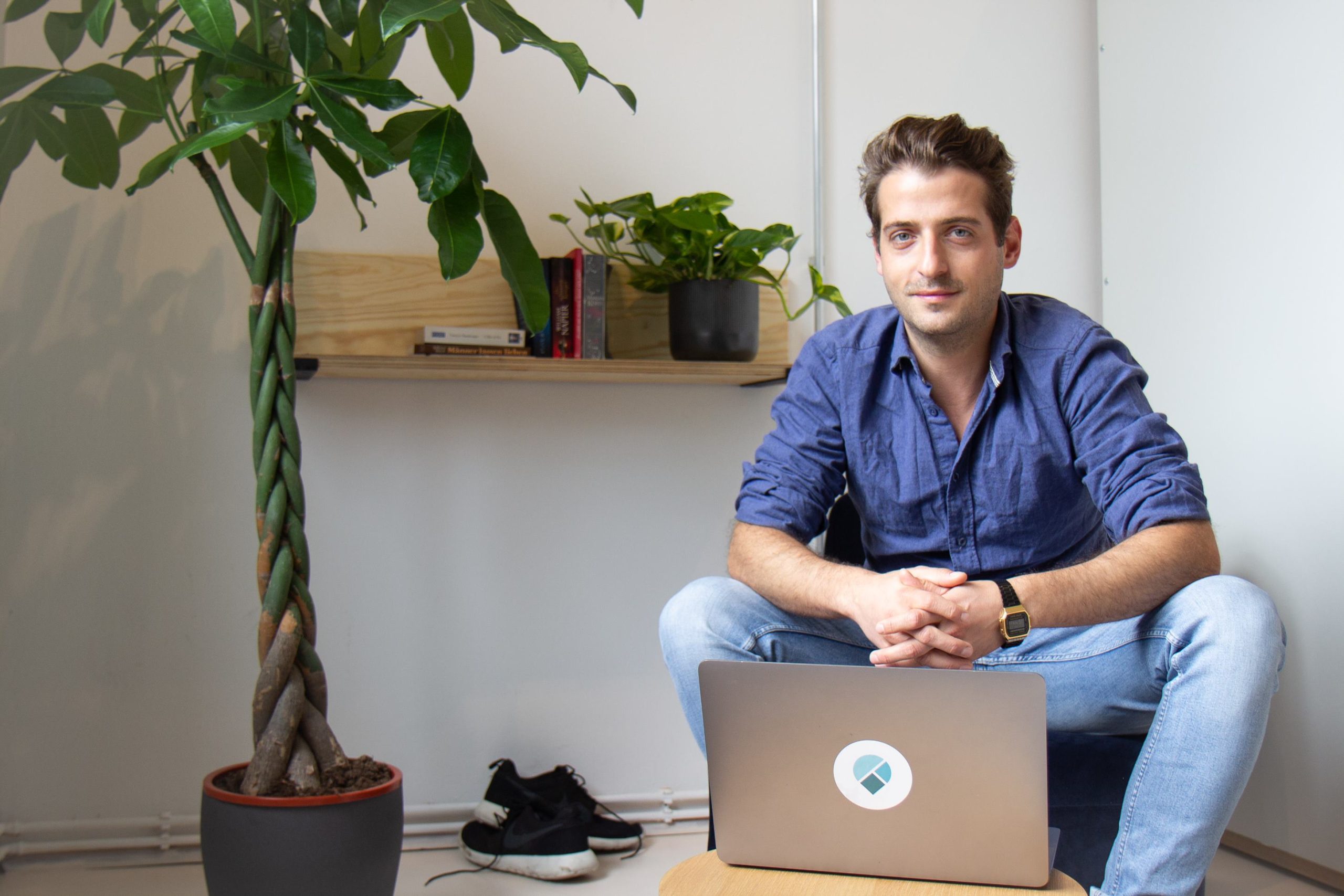Niklas Gossel sitting in front of his work laptop